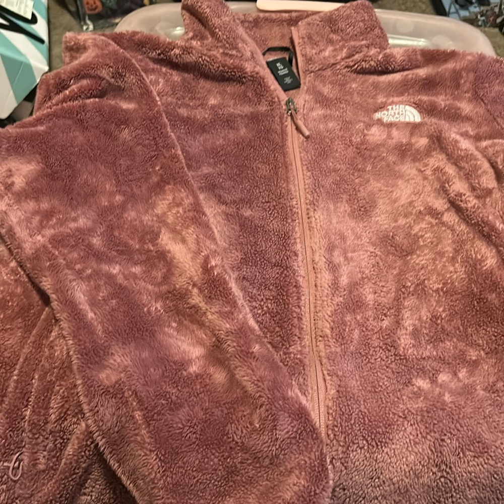 The North Face Women’s Plush Pink Zip Jacket
Size XL Good Condition